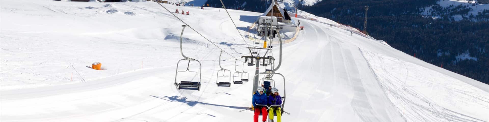Corvara in Badia which includes a gondola, mountains and snow