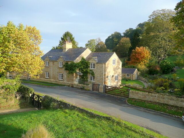 Cottage in Buckland A fine dwelling viewed from the elevated churchyard of St. Michael's church to the south.