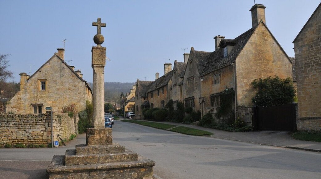 Cross in Stanton. Cross with a sundial on the side of the main street through the village of Stanton.