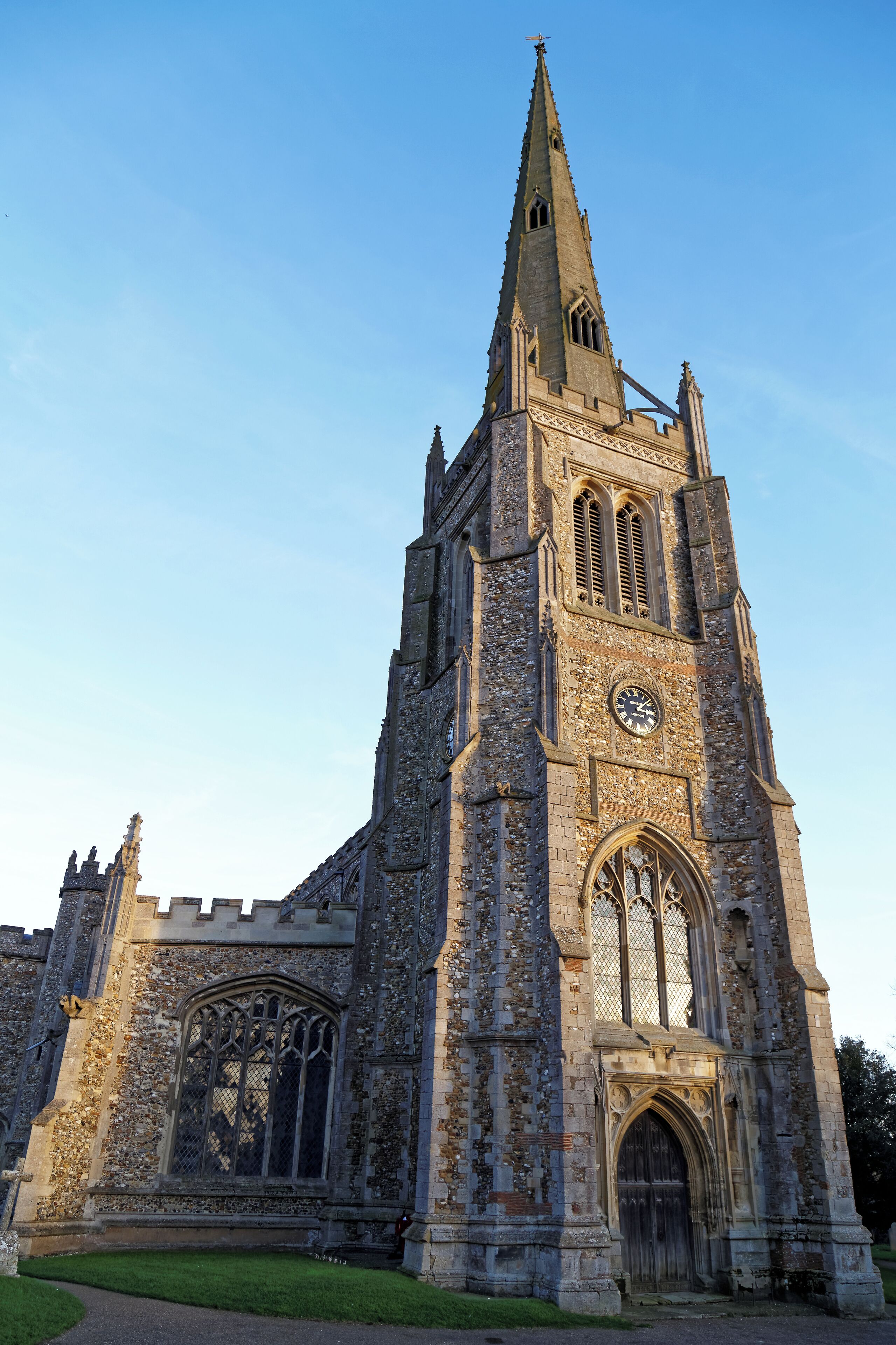 The north-east of the Church of St John the Baptist from the churchyard at Thaxted, Essex, England. Software: JPEG file optimized and/or cropped and/or spun with DxO OpticsPro 10 Elite and Adobe Photoshop CS2.