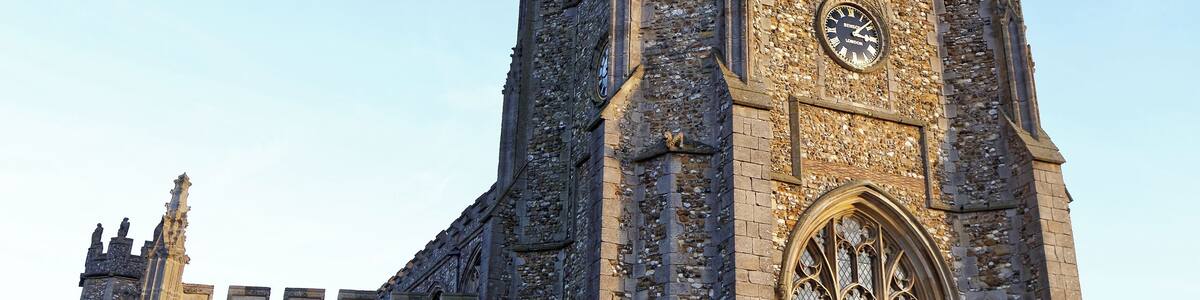 The north-east of the Church of St John the Baptist from the churchyard at Thaxted, Essex, England. Software: JPEG file optimized and/or cropped and/or spun with DxO OpticsPro 10 Elite and Adobe Photoshop CS2.