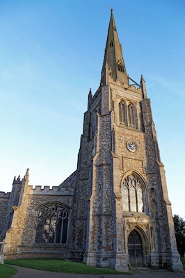 The north-east of the Church of St John the Baptist from the churchyard at Thaxted, Essex, England. Software: JPEG file optimized and/or cropped and/or spun with DxO OpticsPro 10 Elite and Adobe Photoshop CS2.