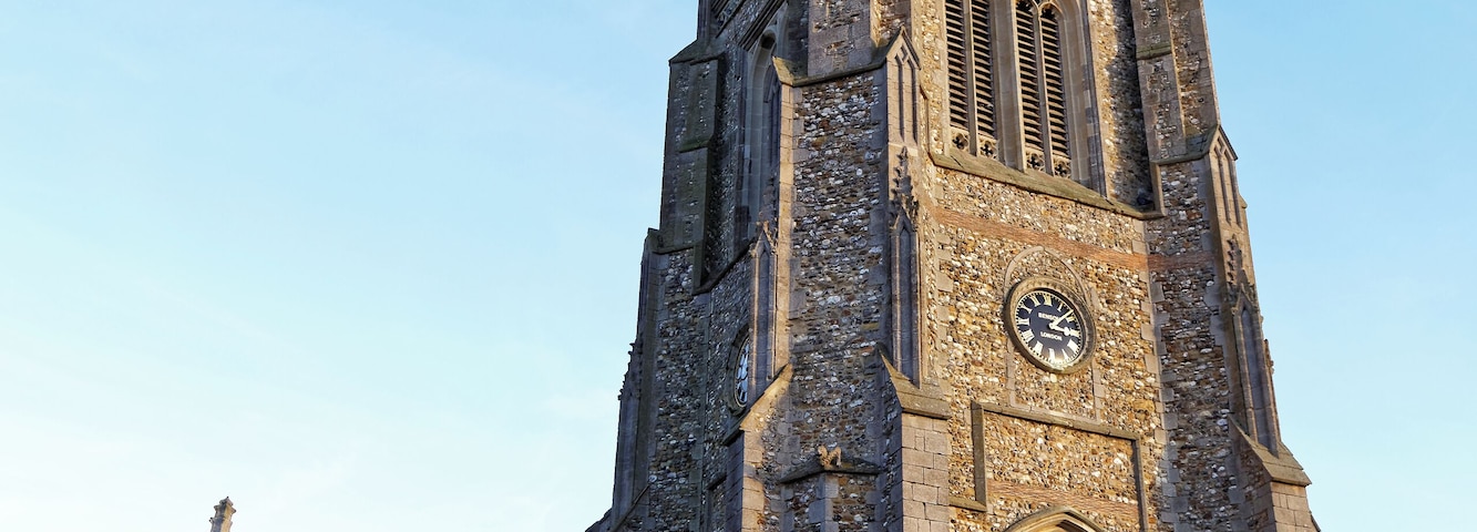 The north-east of the Church of St John the Baptist from the churchyard at Thaxted, Essex, England. Software: JPEG file optimized and/or cropped and/or spun with DxO OpticsPro 10 Elite and Adobe Photoshop CS2.