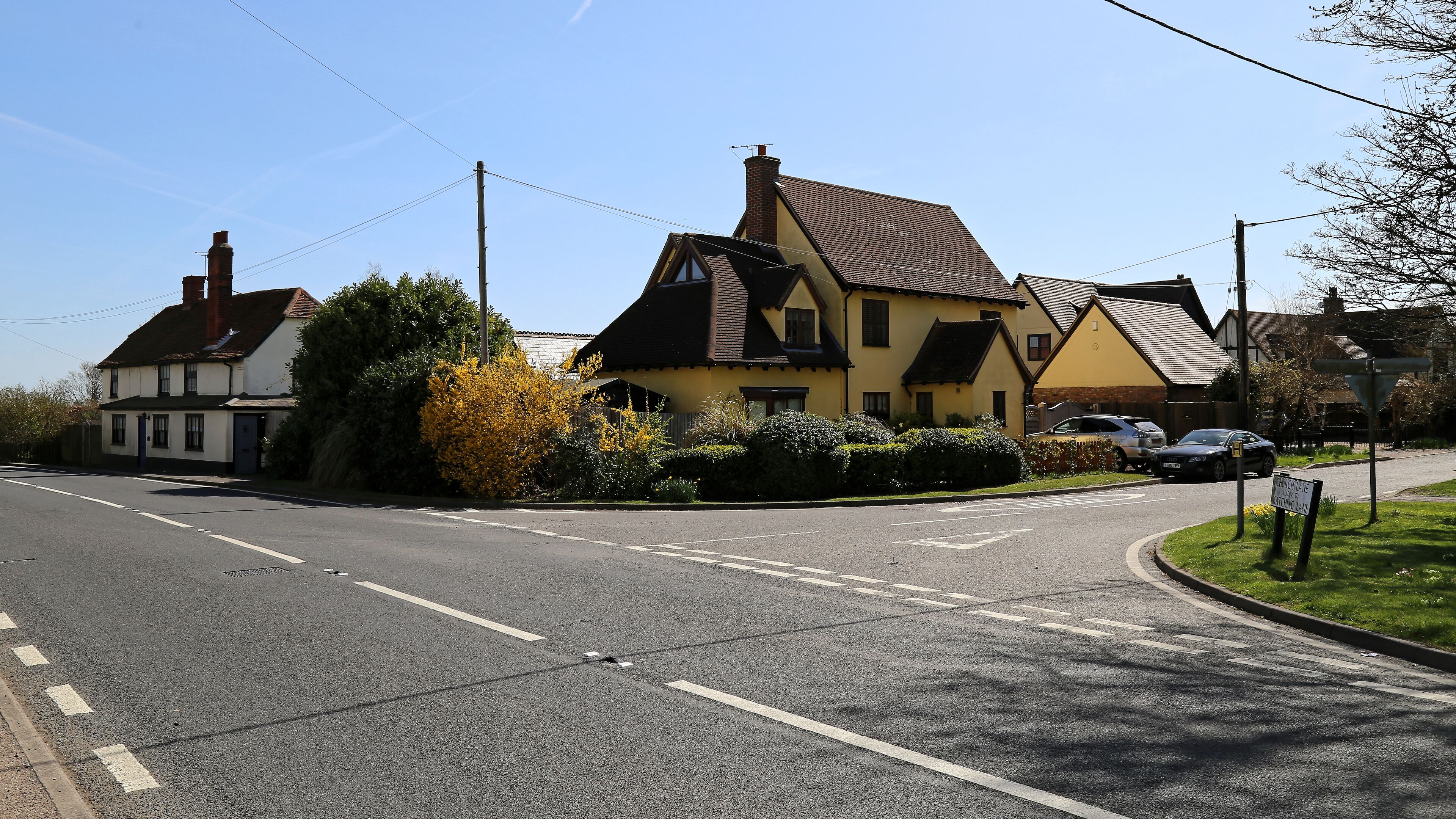 The junction of Church Lane with the A1060 Bishop's Stortford to Sandon road in the village of White Roding, Essex, England. Software: JPEG file optimized and/or cropped and/or spun with DxO OpticsPro 10 Elite and Adobe Photoshop CS2.