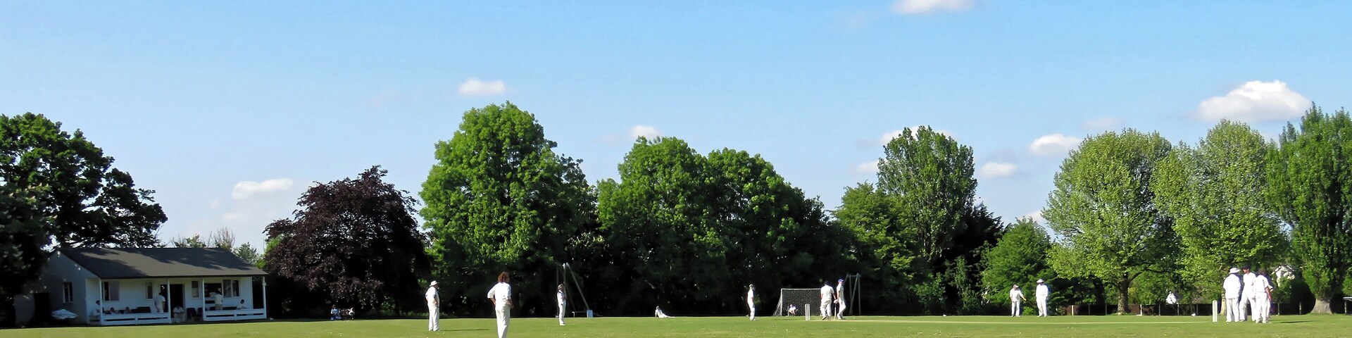 Eastons Cricket Club at The Recreation Ground, Manor Road, Little Easton, Essex, England. Camera: Canon PowerShot SX60 HS Software: File lens-corrected, optimized, perhaps cropped, with DxO PhotoLab, and likely further optimized with Adobe Photoshop CS2.