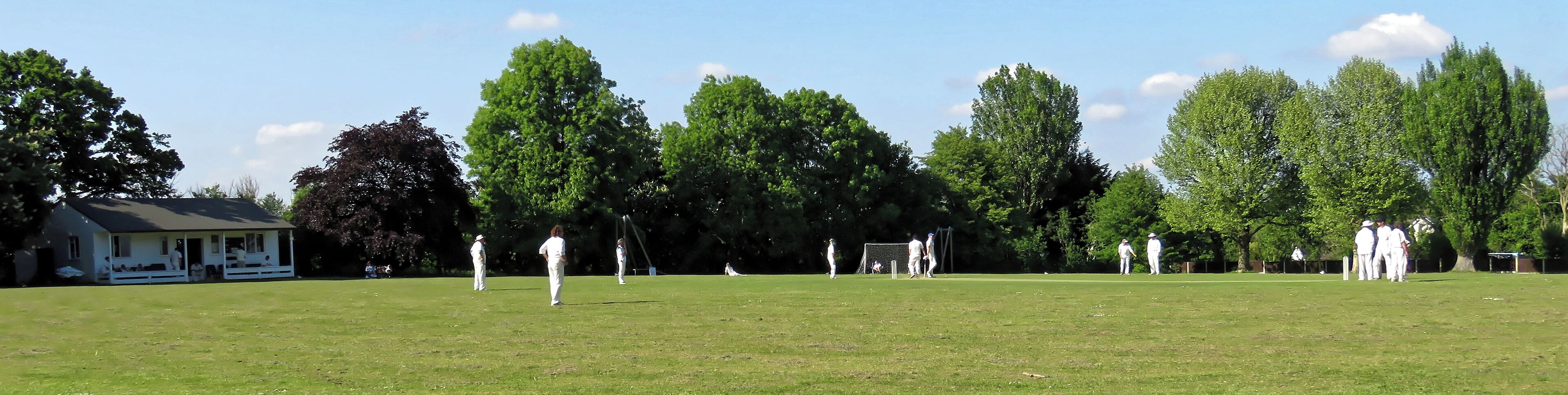 Eastons Cricket Club at The Recreation Ground, Manor Road, Little Easton, Essex, England. Camera: Canon PowerShot SX60 HS Software: File lens-corrected, optimized, perhaps cropped, with DxO PhotoLab, and likely further optimized with Adobe Photoshop CS2.