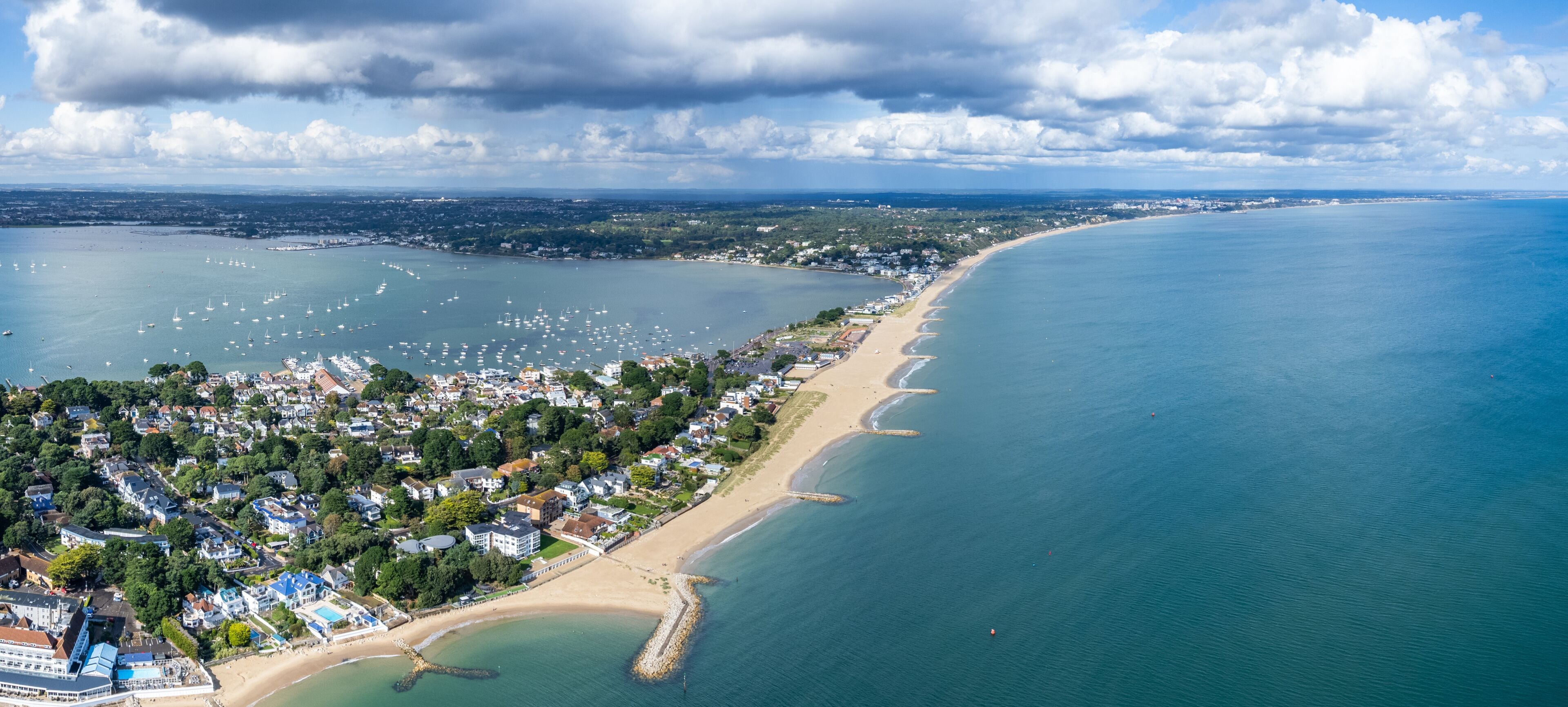 amazing aerial panorama view of Sandbanks Beach and Cubs Beach in Bournemouth, Poole and Dorset, England.