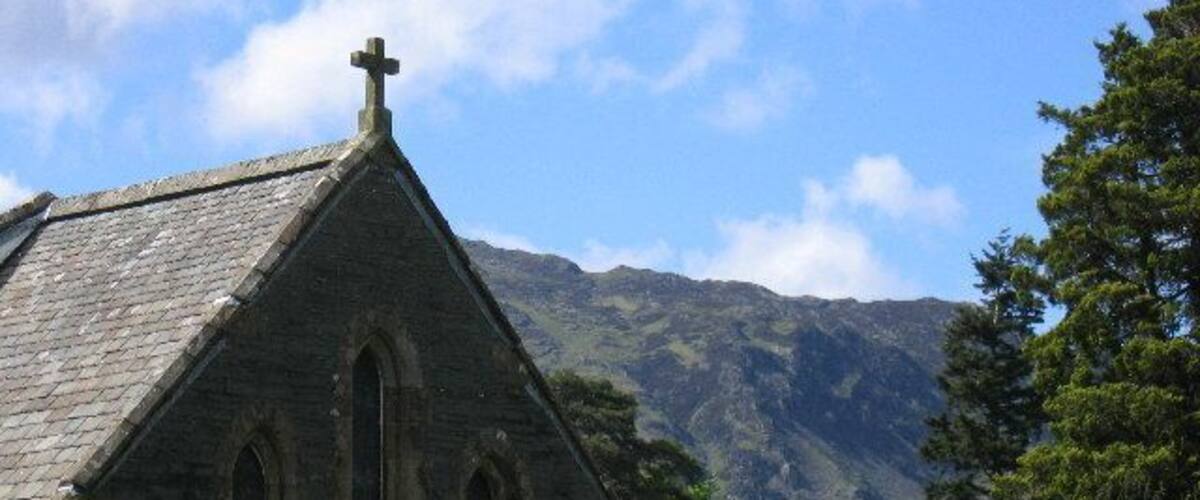 View northwest from St Andrew's parish churchyard, Borrowdale, Cumbria, with the chancel gable on the left