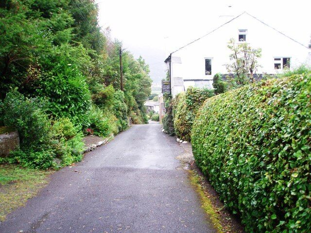 Footpath to Whinlatter Forest Park This photograph shows part of the footpath that runs from the small village of Thornthwaite in a south-westerly direction towards Thornthwaite Forest and Whinlatter Forest Park. Just beyond the houses shown in this picture the path enters the forest and follows the course of Comb Beck. The path then makes its way to Comb Plantation and the visitors' centre.