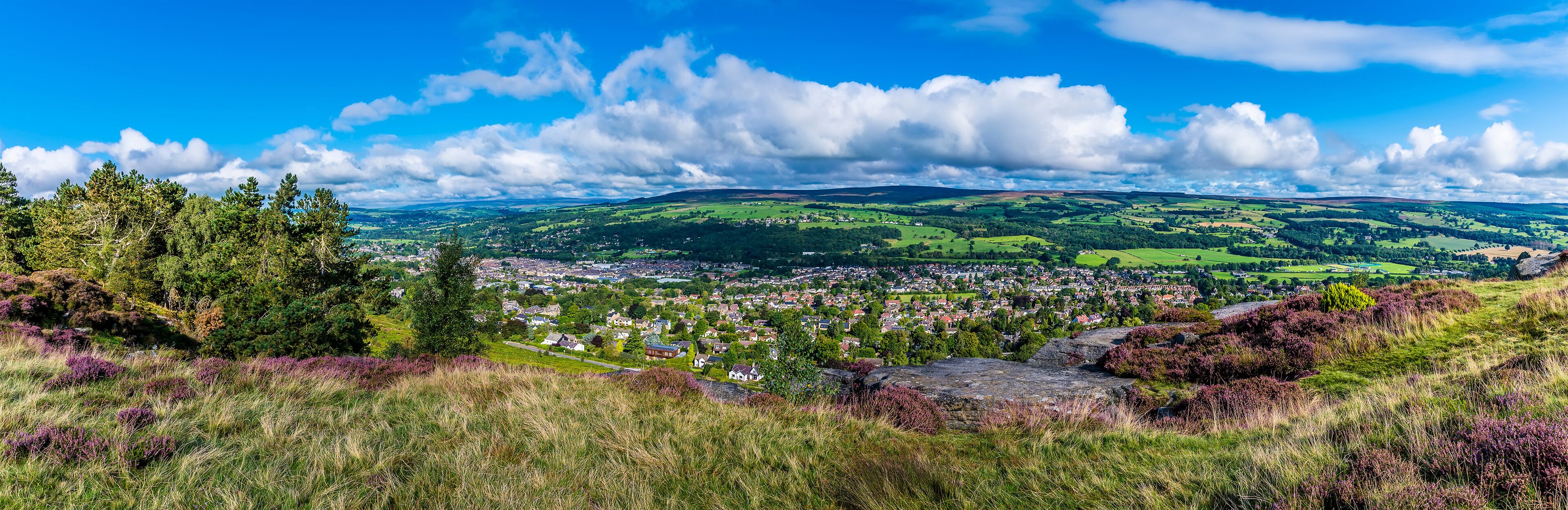 A panorama view from Ilkley moor over Wharfedale and the town of Ilkley Yorkshire, UK in summertime