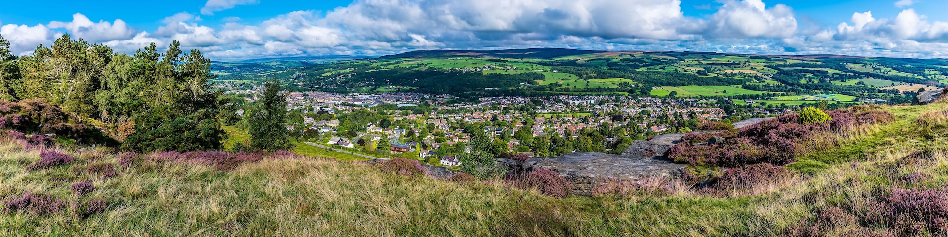 A panorama view from Ilkley moor over Wharfedale and the town of Ilkley Yorkshire, UK in summertime