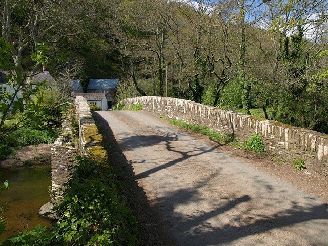 Newmill Bridge. Similar to 1296087, looking across 1296037 from the left bank of the River Avon, at the T-junction with the lane up the valley past the station. This lane was the former main road to Loddiswell.