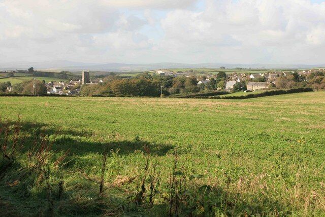 Pelynt in the distance As seen from the gateway by Becons trig point, Pelynt churchtower is in the middle of the village with Hall Barton farm on the right.
