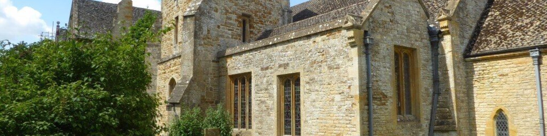South aisl and tower of the parish church of St Denys, Little Compton, Warwickshire, seen from the southeast