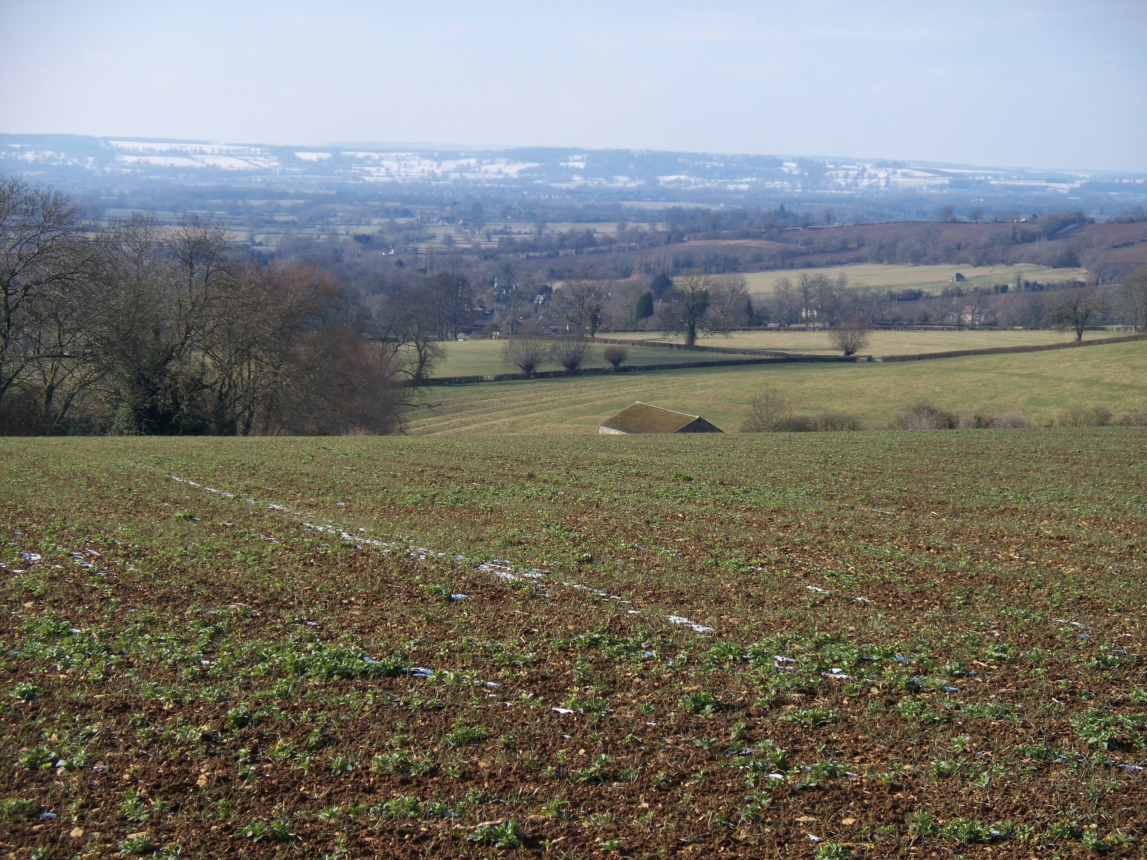 Hill barn and view Here the view is looking out over the roof of the small hill barn. Little Compton is seen on the valley floor and Bourton Hill [SP1631]] is in the centre in the far distance.