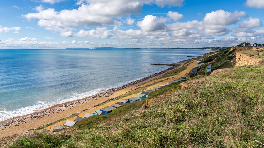Beach Huts on the Channel Coast in Barton-on-sea, Hampshire, England, UK