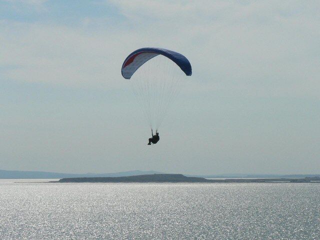 Hengistbury Head from Barton on Sea This view of Hengistbury Head was taken from Marine Parade East, Barton on Sea. The paraglider is far closer to Barton than to Hengistbury! Purbeck is in the distance.
