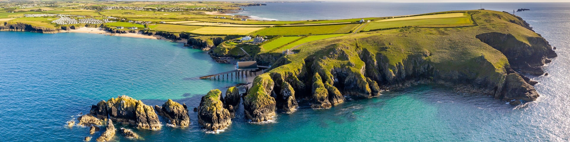 Aerial vista of Trevose Head, Padstow Lifeboat Station and Mother Iveys Bay, North Cornwall