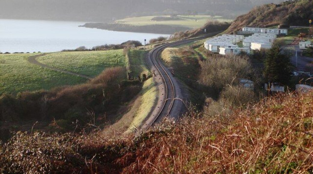 Railway line, Sugar Loaf, near Three Beaches The railway snakes round beautifully past the caravan park towards Broad sands.