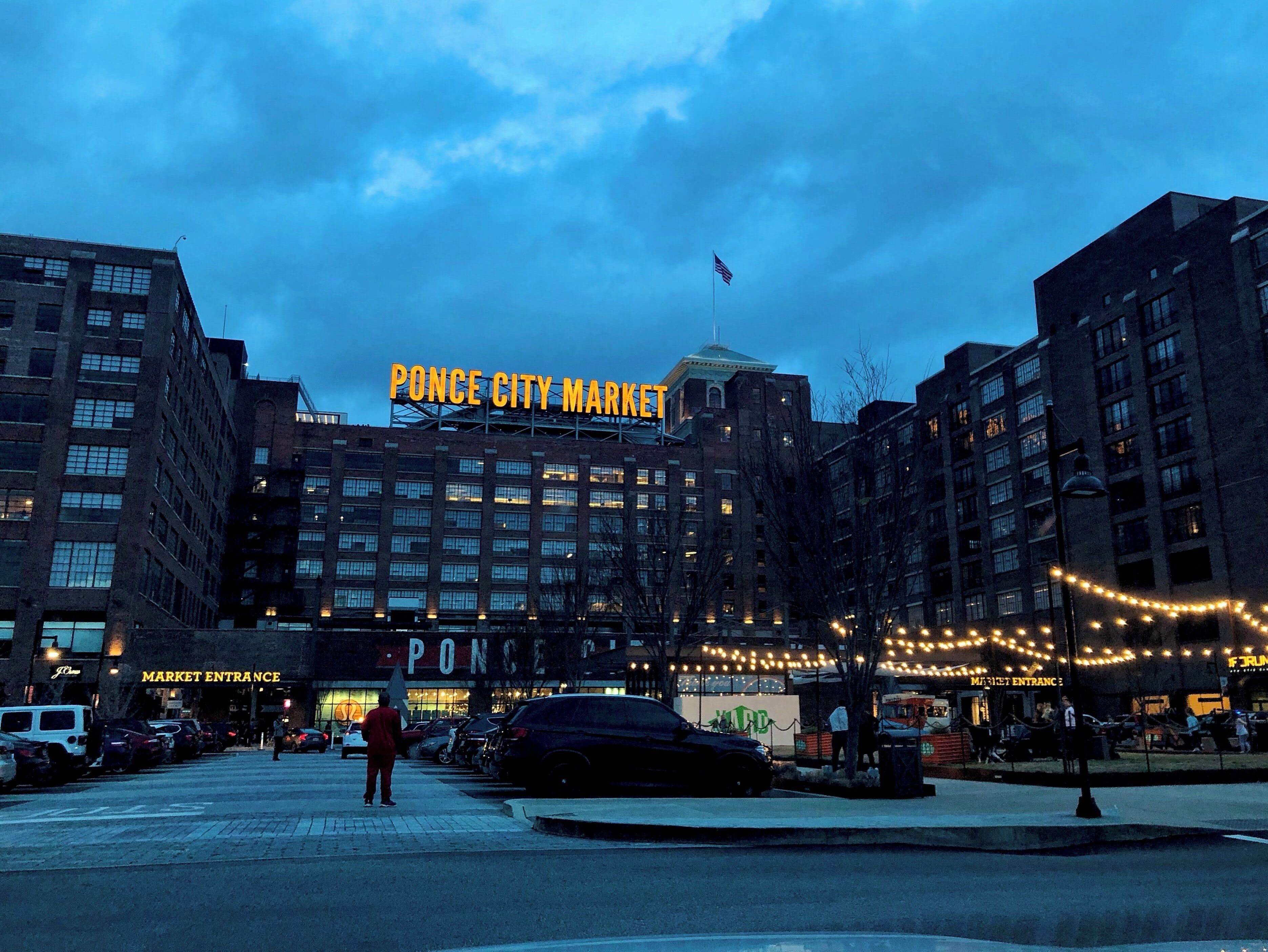 A cityscape with the 'Ponce City Market' sign prominently displayed.
