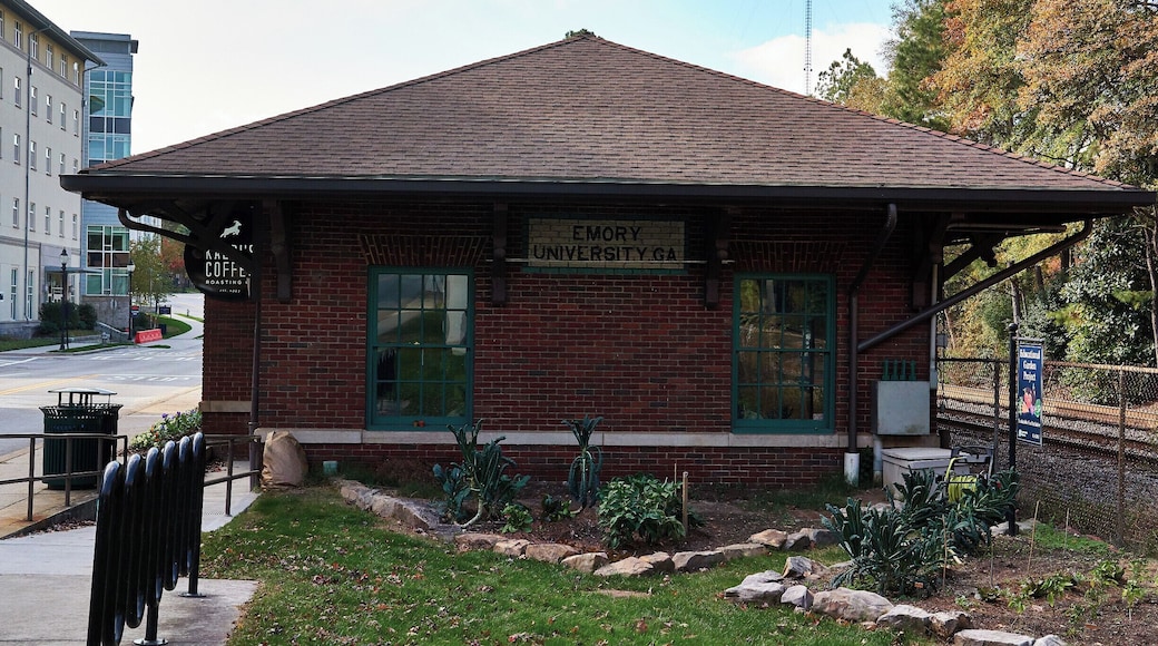 This building has a bit of a history. It was built in 1926 and was the former Emory University railway station for passengers and freight. The present name which is “Dooley’s Den ‘The Depot’” is a reference to the Spirit of Emory - do a Google search for information on Dooley - and the building presently serves coffee. For some time in the 70’s and into the ‘80s the building was actually the location of the Emory Credit Union.