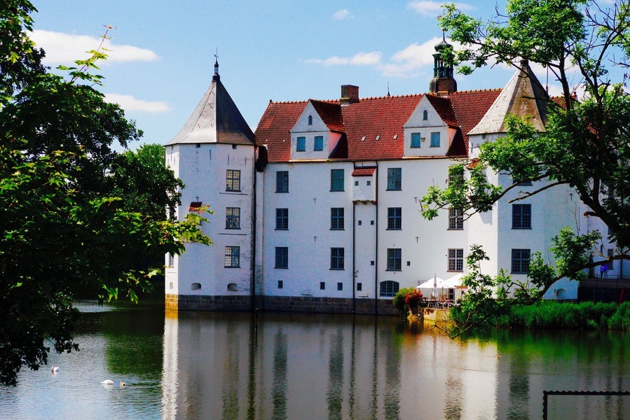 Glücksburg castle is a castle on the water, built in 1582 the interior is beautiful and intricate, just like the exterior. When we visited we took the tour with a woman dressed in period clothing, you see a painting of a man who's shoe follows you around the room and toilets in closets. The grounds of the castle are stunning, and close to the little town of Glücksburg. If you are hungry there is a few pretty places to eat in the centre, but we stopped at a little grocery store and took a sandwich to the grounds as they were so lovely.