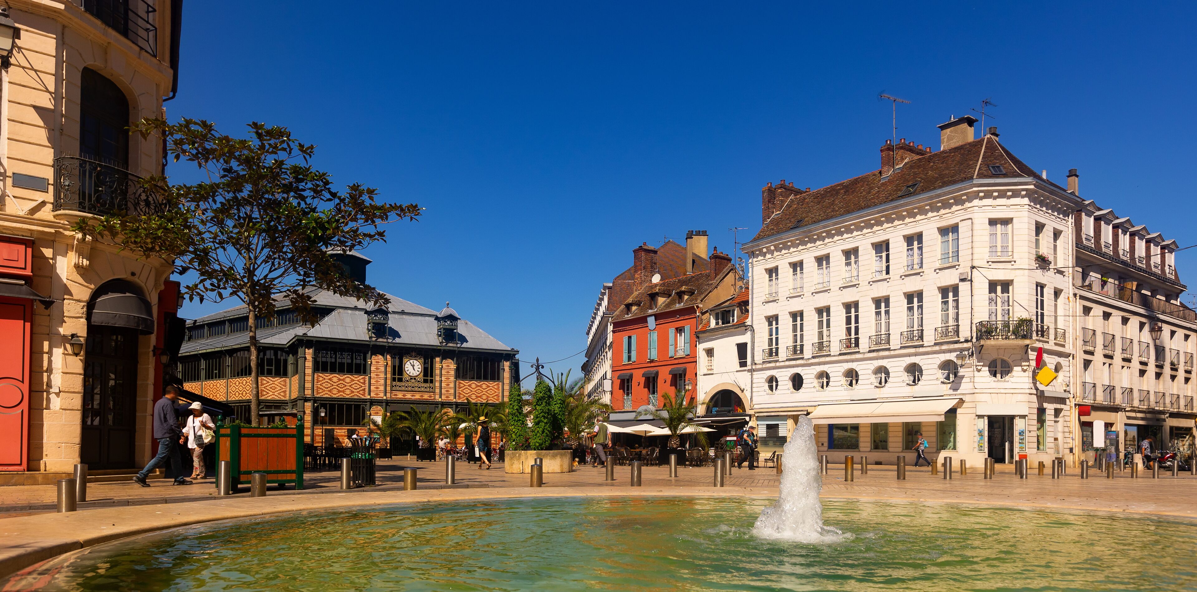 Peaceful streets of Sens, France. Buildings along walkway during daytime.