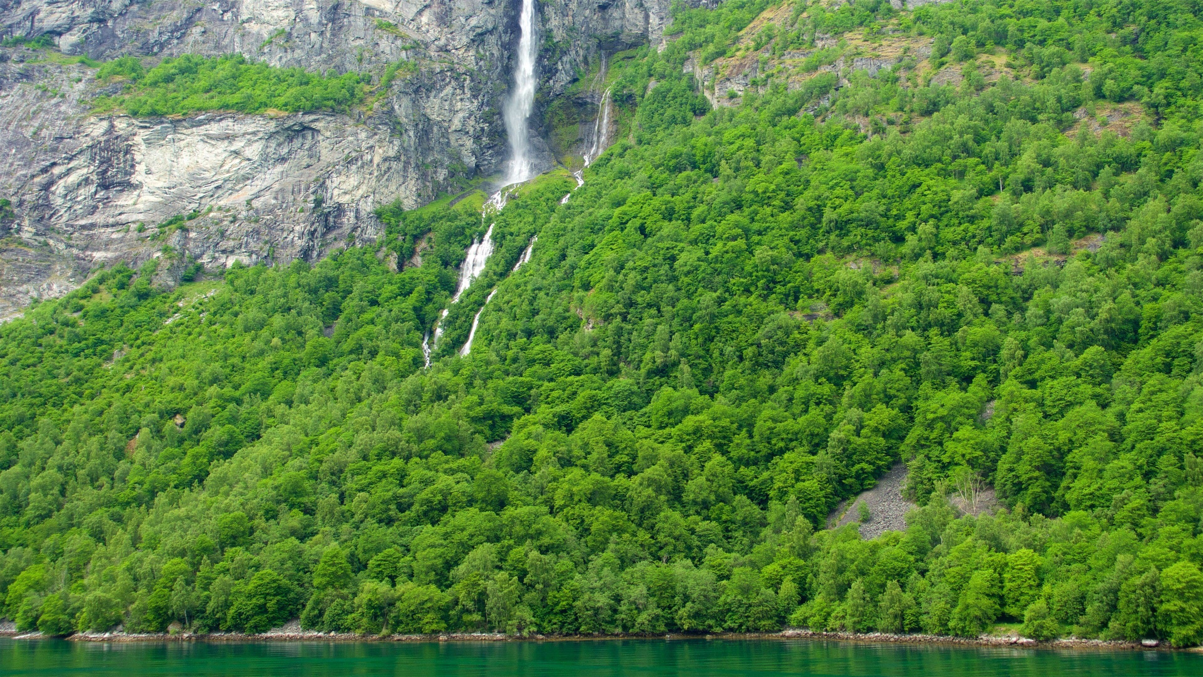 Geiranger which includes a river or creek and a waterfall