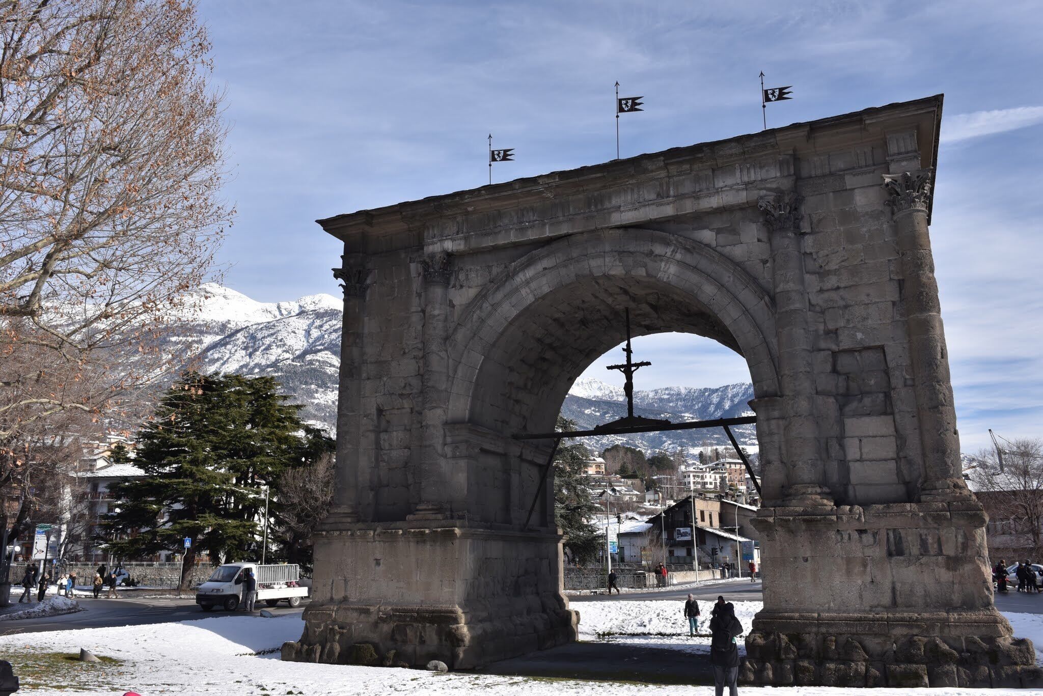 Lying between two rivers and surrounded by majestic mountains, the city of Aosta is a concentration of history and added picturesque traditions. The town has Roman origins, as it is evident from its name, which evokes the one of its founder: the Emperor Augustus. While walking around Aosta it is possible to notice traces of the original town; there are also many Roman monuments, including the Arch of Augustus, the Porta Pretoria, the theatre, the forum and the city walls, almost perfectly preserved. 