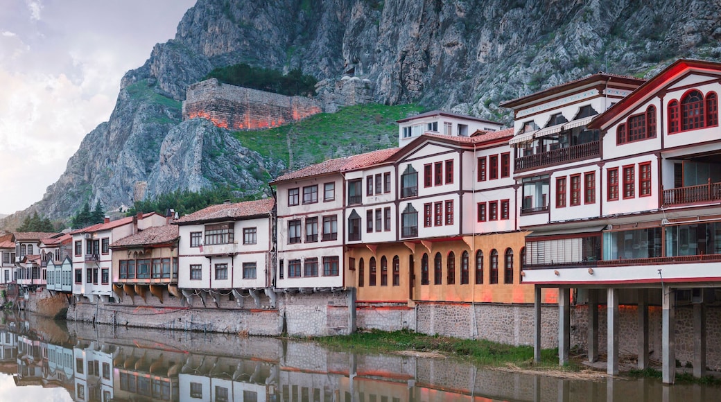 Amasya,TURKEY old riverside Turkish(ottoman) city buildings and its reflection on water,sunny summer day.Amasya is city of princes of ottoman. ottoman Princes were educated in Amasya
