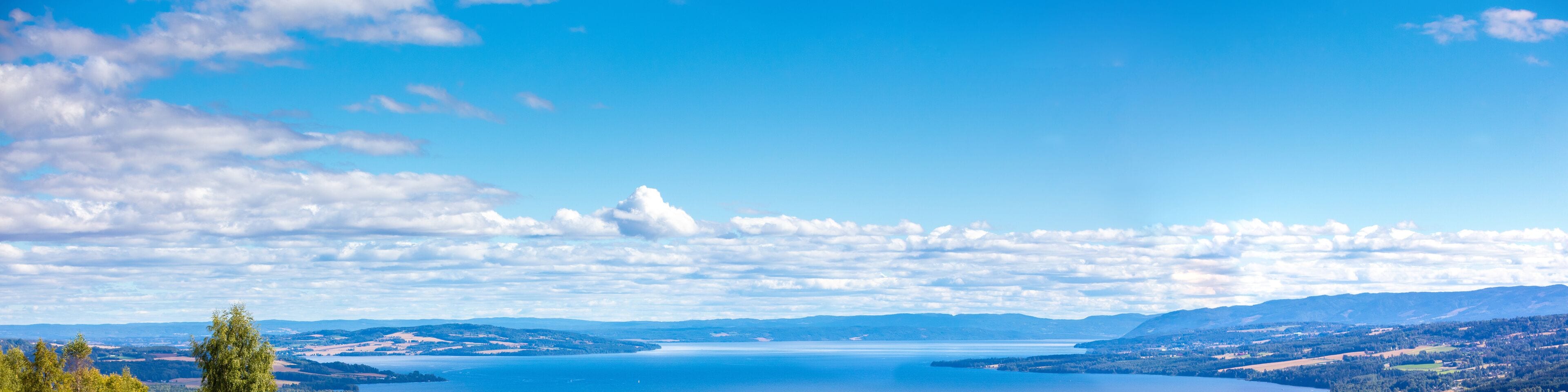 Panoramic view of a beautiful lake Mjosa and Gjovik city in summer. Norway
