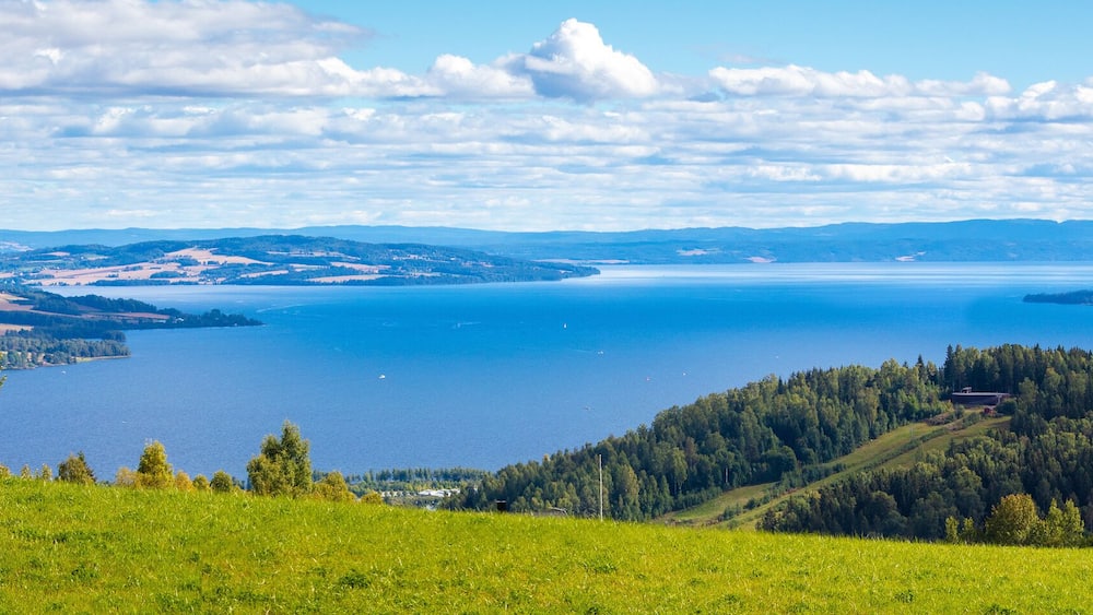 Panoramic view of a beautiful lake Mjosa and Gjovik city in summer. Norway
