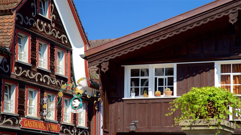 A traditional wooden building with a sign reading "GASTHAUS".