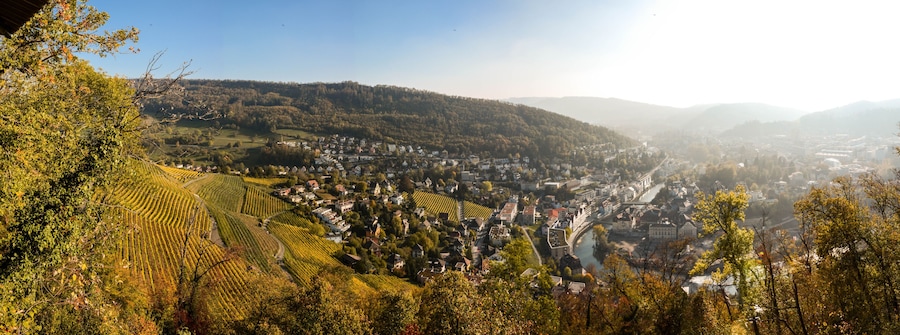 scenic panorama of a city in baden aargau switzerland in autumn with fog in background