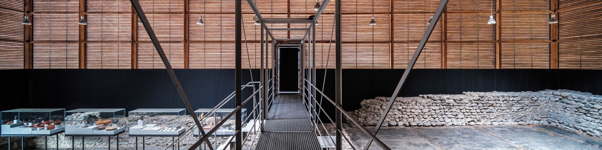 This shelter over the Roman archaeological site in Chur was one of Peter Zumthor’s first projects in 1986. It is built almost exclusively from timber lamella that allow both light and ventilation into the museum space.