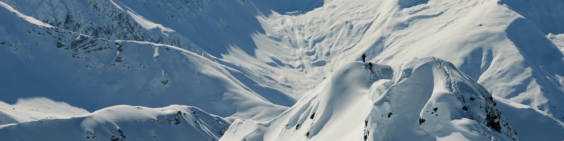 Davos showing mountains, snow and a sunset