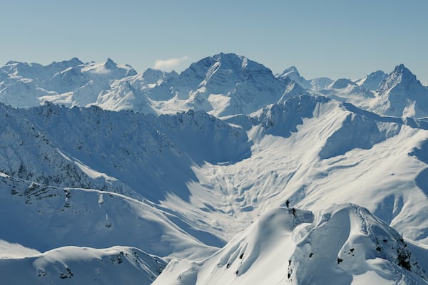 Davos showing mountains, snow and a sunset