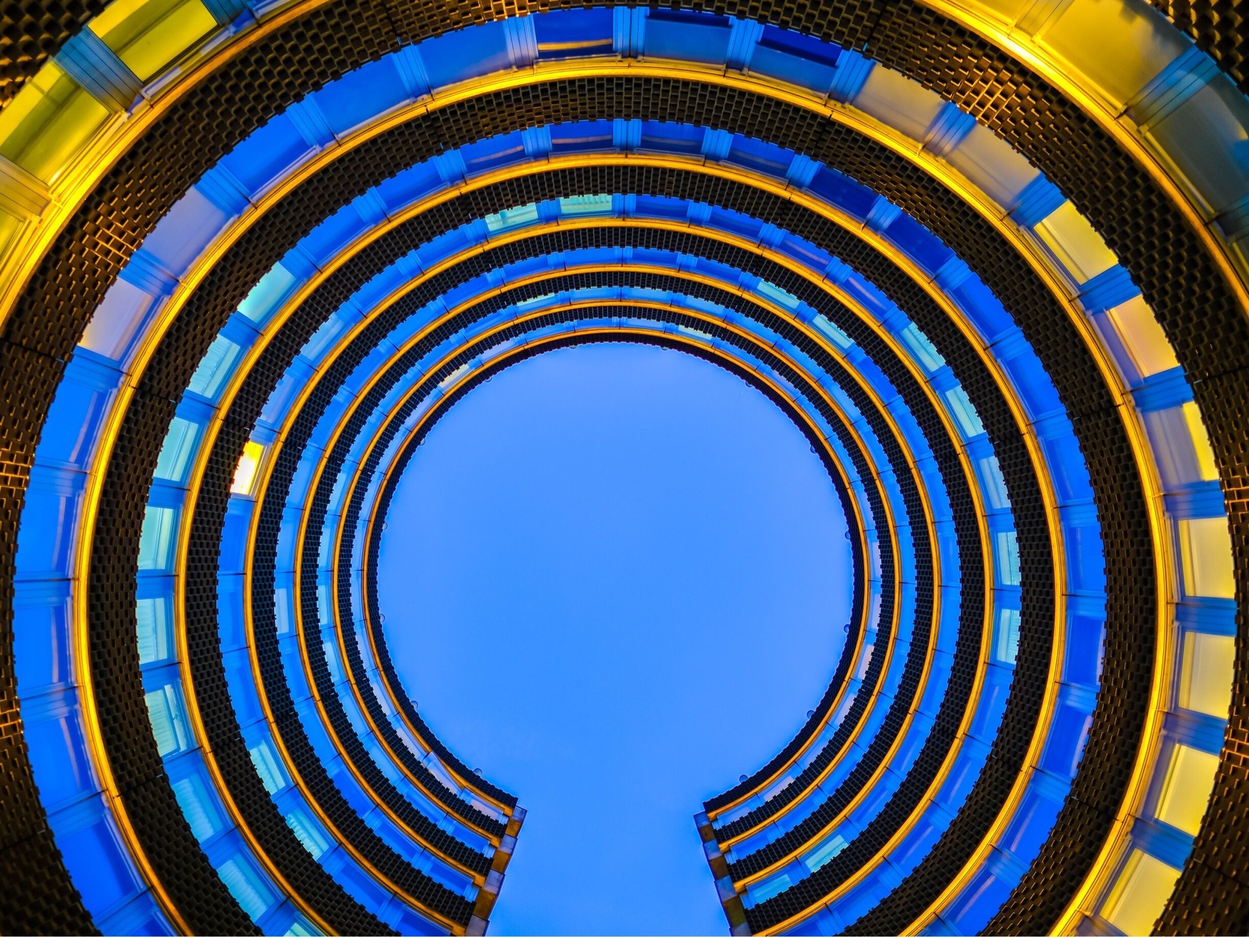 Round, modern building. Easy access from the bus stop. From a photography perspective I recommend going after sunset when there’s still some light left and the interior lights start to be switched on #urbanjungle #bvsblue
