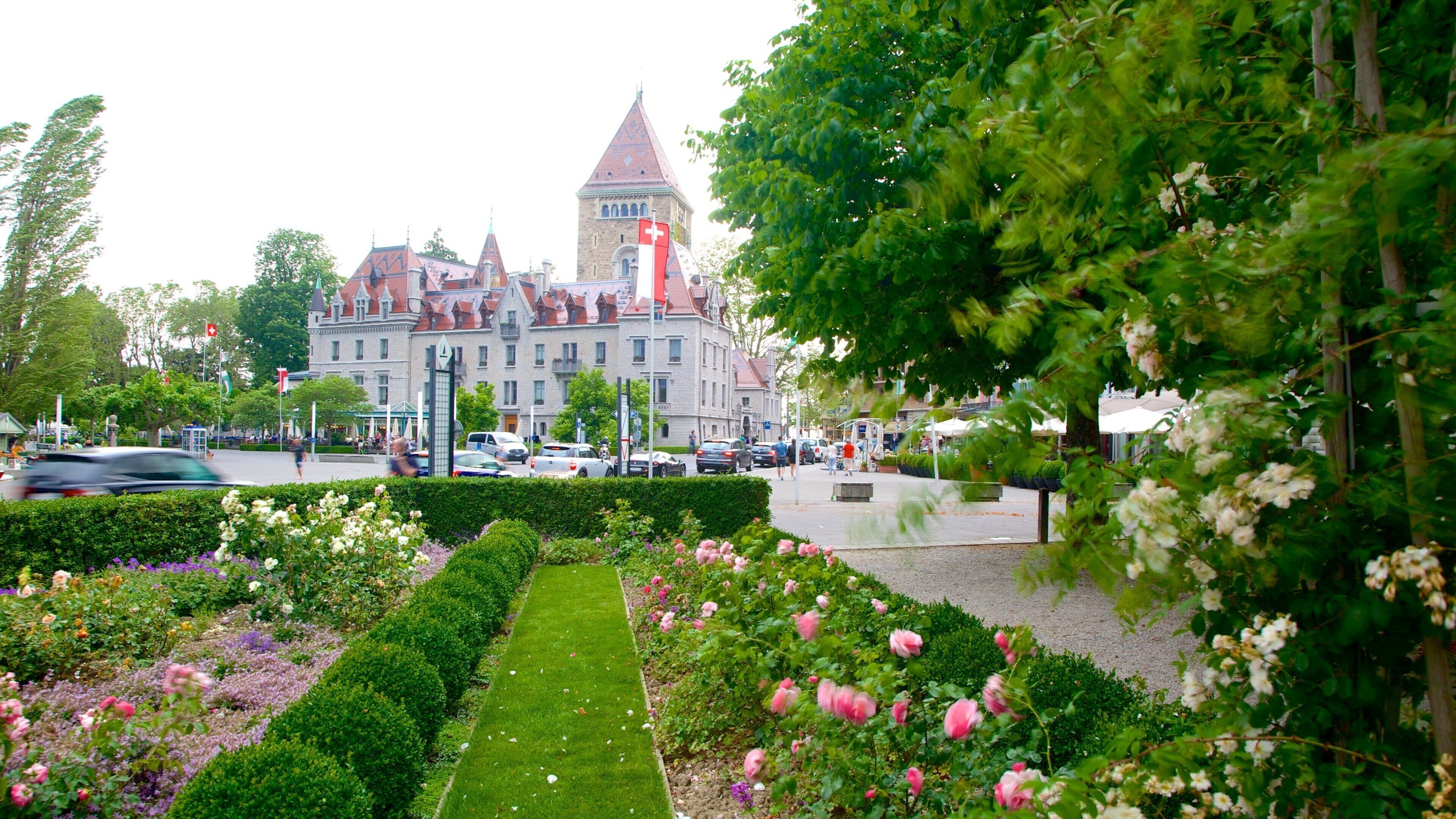 Lausanne which includes a park and flowers