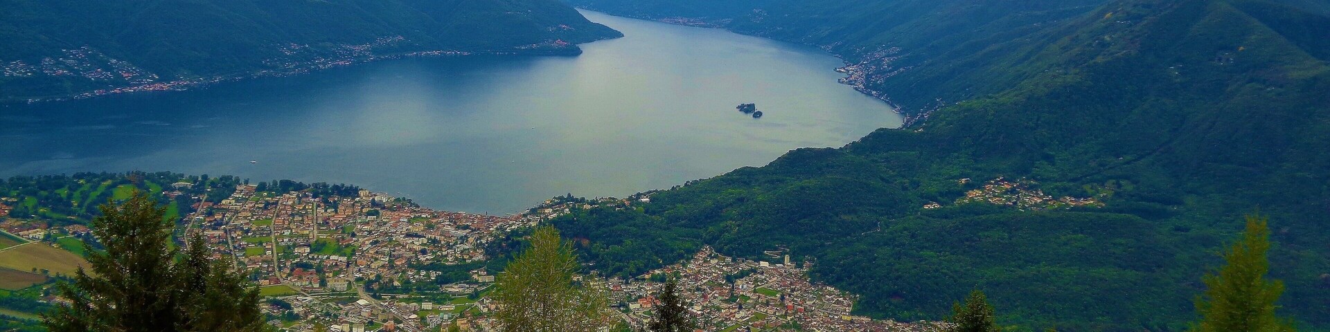 Above the beautiful city of Locarno in Ticino, Switzerland! I took this photo from the Cardada tourist resort area. One of my best memories from my Switzerland trip :). I was there in May 2016. You can definitely see that Spring is alive!