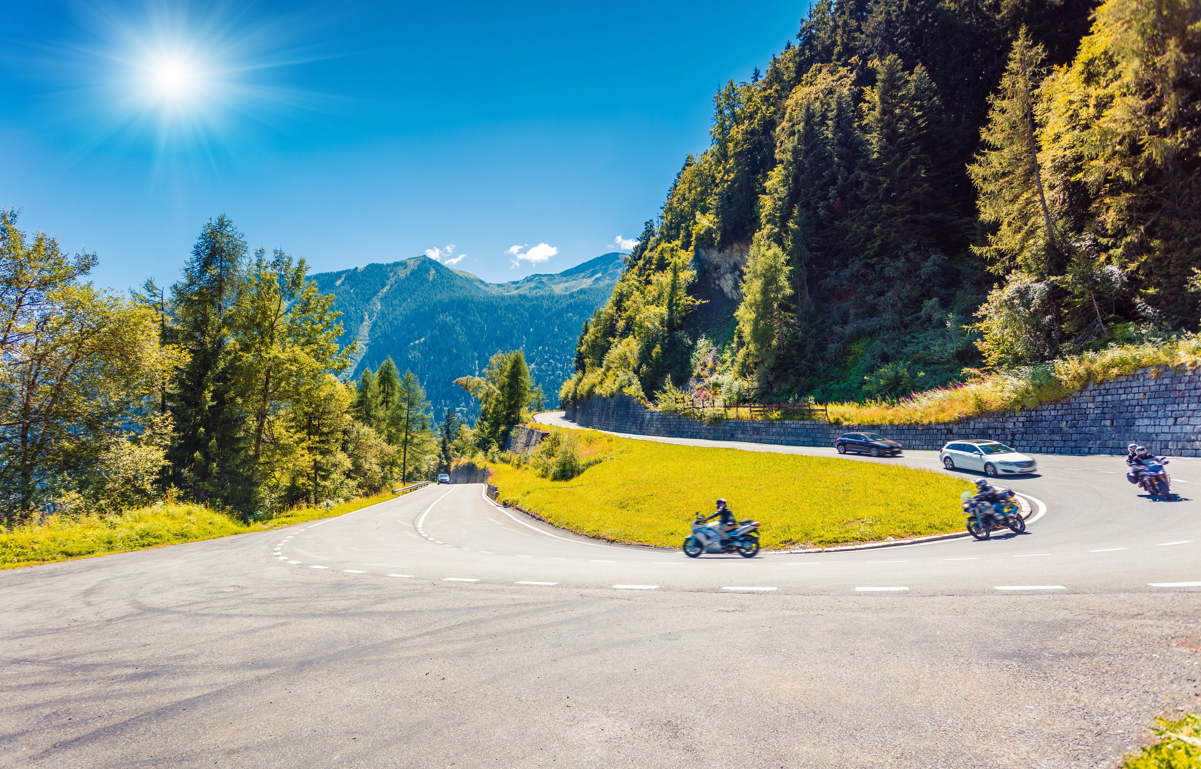 Mountain pass between France and Switzerland. Sunny summer view of Route de la Forclaz roud. Great morning scene of Swiss Alps, Switzerland, Europe. Traveling concept background.