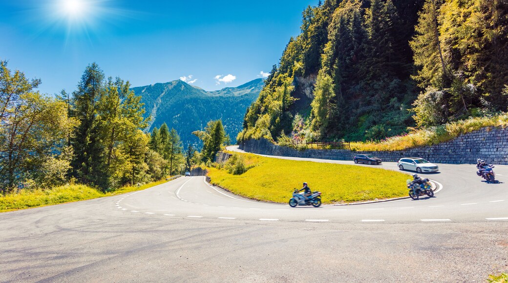 Mountain pass between France and Switzerland. Sunny summer view of Route de la Forclaz roud. Great morning scene of Swiss Alps, Switzerland, Europe. Traveling concept background.