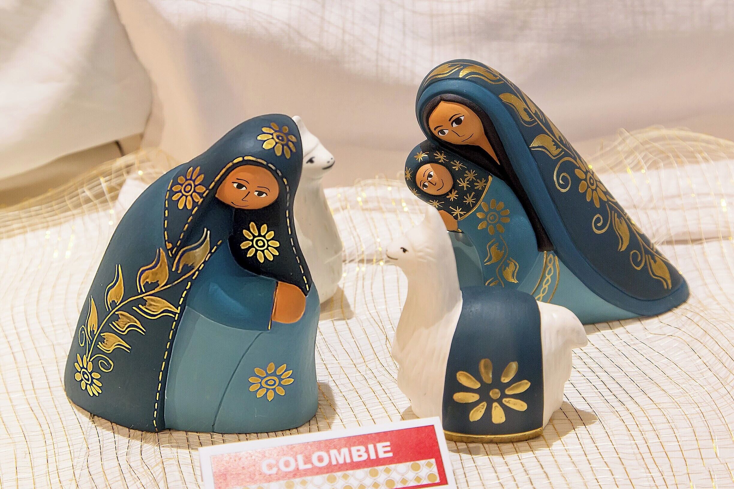 The Basilica gift shop displays a hundred or so nativity scenes from around the world.  This one from Columbia was one of my favorites.  Simple lines, smiling figures, and cute alpacas are hard to beat.