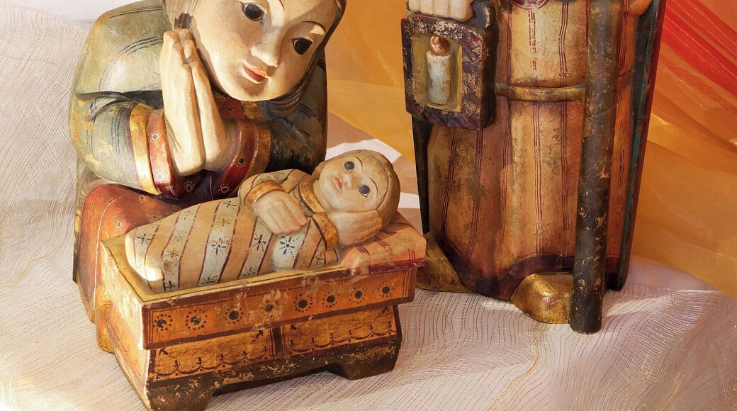 The Basilica gift shop displays a hundred or so nativity scenes from around the world. I forget where this one is from, but the no-frills wooden figures seem peaceful to me.