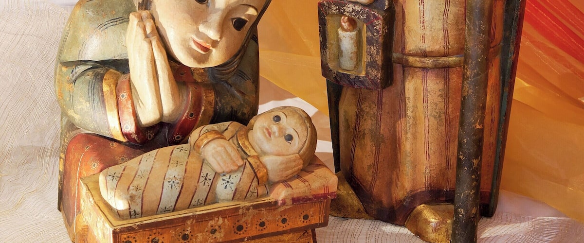 The Basilica gift shop displays a hundred or so nativity scenes from around the world.  I forget where this one is from, but the no-frills wooden figures seem peaceful to me.
