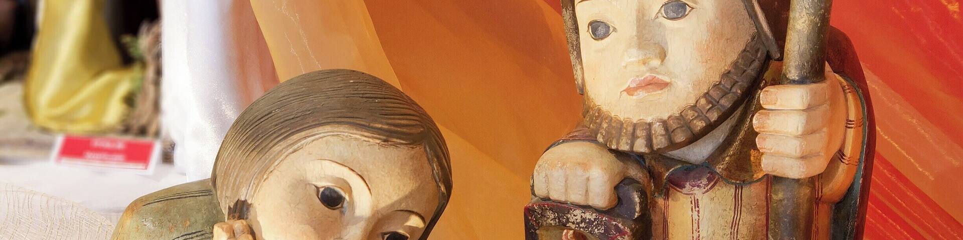 The Basilica gift shop displays a hundred or so nativity scenes from around the world. I forget where this one is from, but the no-frills wooden figures seem peaceful to me.