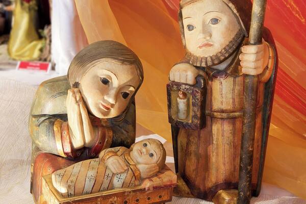 The Basilica gift shop displays a hundred or so nativity scenes from around the world. I forget where this one is from, but the no-frills wooden figures seem peaceful to me.