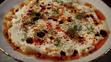 Turkish food is one of our favourites, and this dish of manti beats them all. A small ravioli type pasta (filled with spiced meat), covered in a yogurt sauce with chili oil and dill.
We enjoyed it in many places throughout Turkey, but it was in the small town of Burhaniye in the northwest where it was the very best.