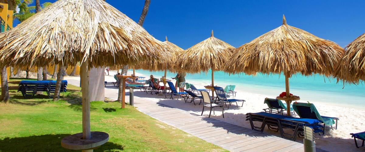 Oranjestad which includes tropical scenes and a beach