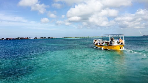 Ferry boat carrying passengers to De Palm island. This off-shore all inclusive resort includes unlimited drinks and buffet, activities such as zip lining, snorkel and bananaboating and a water park! A fun family all day adventure!
